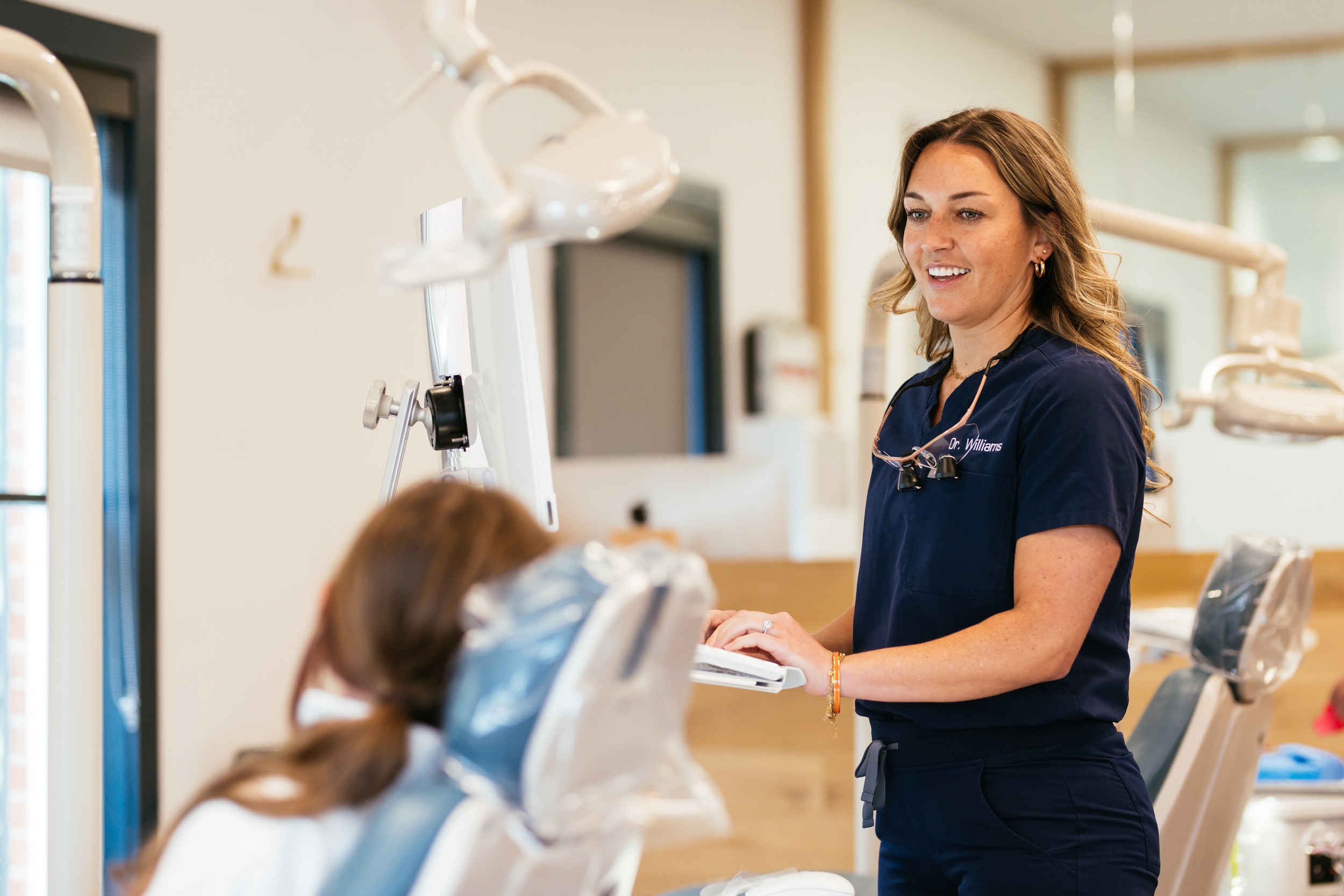 Dr. Williams providing underbite treatment to patient at Sturgill Orthodontics Bristol office