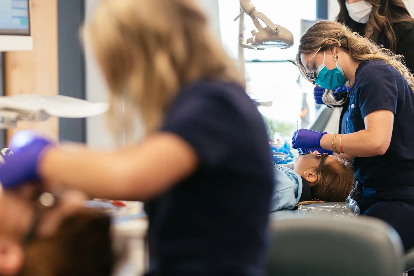 Sturgill Orthodontics orthodontist checking a young patient's bite and palate during an airway evaluation for Bristol, TN and Bristol, VA families